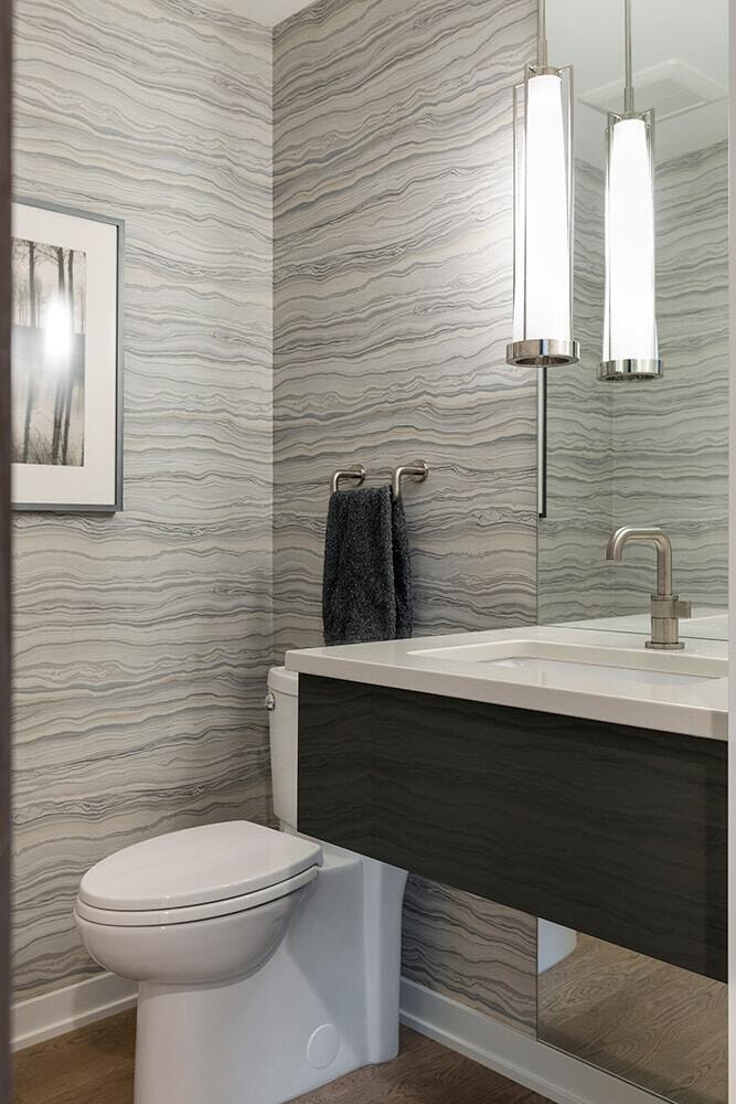 Chic bathroom with gray wave wallpaper by MA Peterson in the Twin Cities