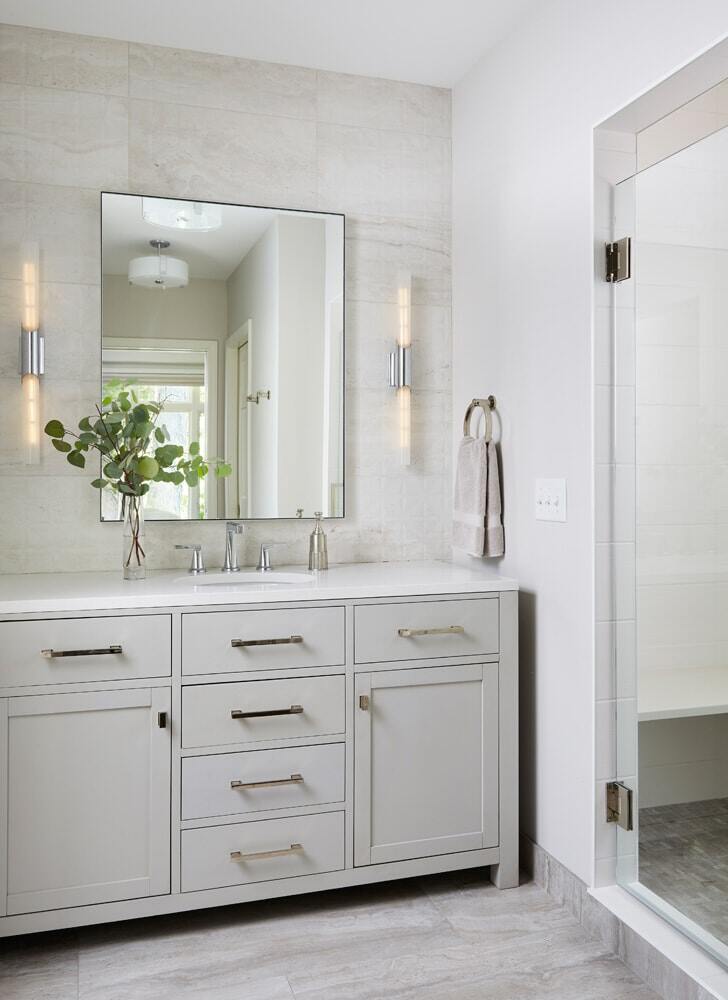 Remodeled bathroom with clean, modern aesthetics by MA Peterson in the Twin Cities