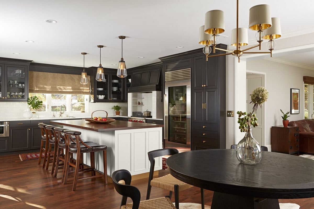 Contemporary kitchen featuring dark cabinets and gold accents, MA Peterson, Twin Cities