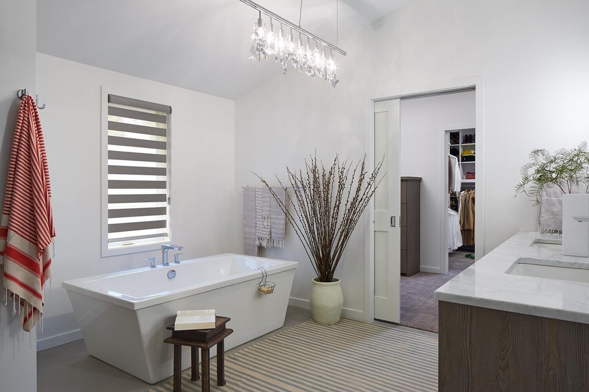 Luxurious Twin Cities bathroom remodel with freestanding tub by MA Peterson