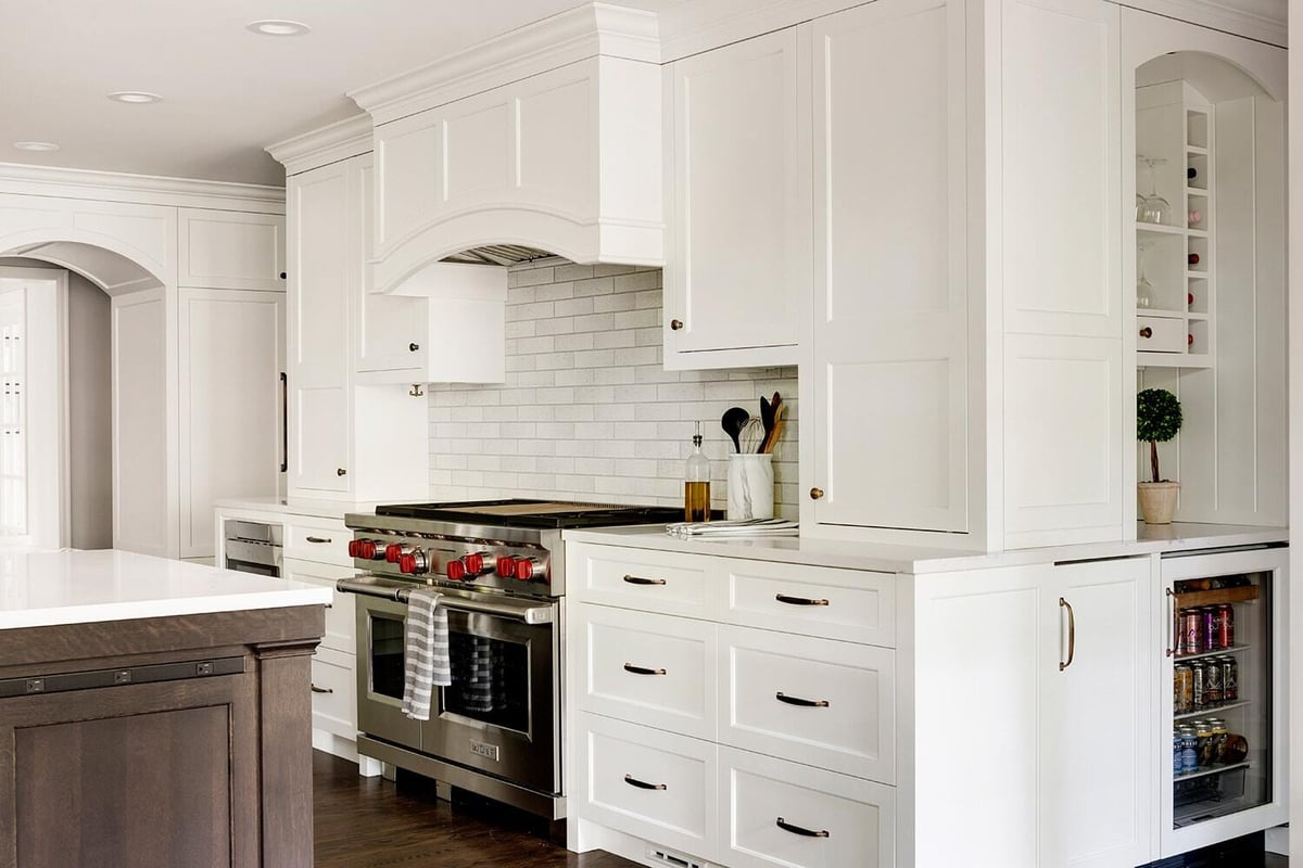 Stylish kitchen remodel featuring high-end stove and custom cabinets by MA Peterson, Twin Cities