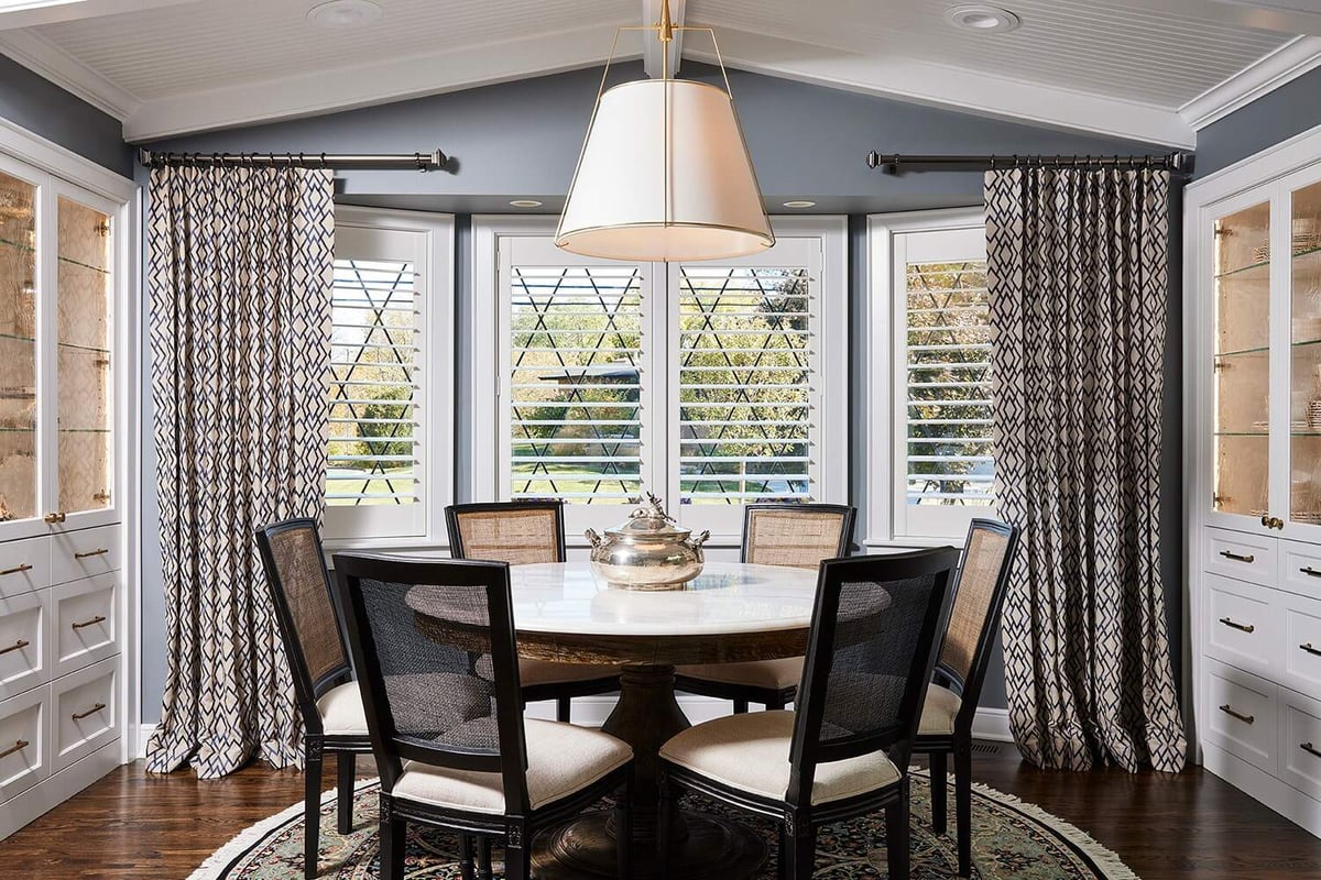 Charming breakfast nook with stylish decor and garden views, designed by MA Peterson in Twin Cities