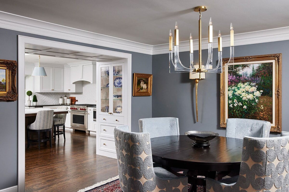 Chic dining area adjacent to a modern kitchen, remodeled by MA Peterson in Twin Cities