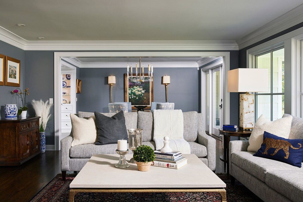 Stylish living room with grey couches and decorative accents, designed by MA Peterson in Twin Cities