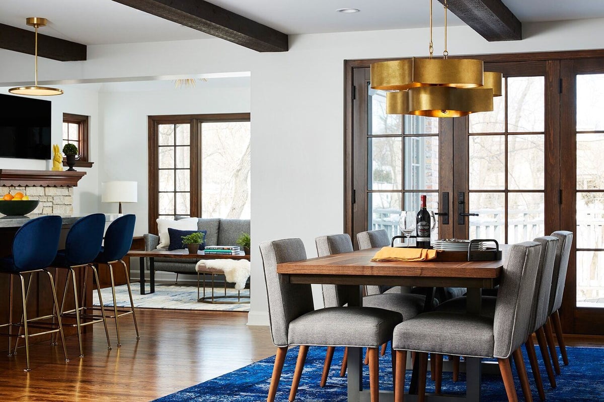 Remodeled open-concept space with dining and living areas by MA Peterson in the Twin Cities