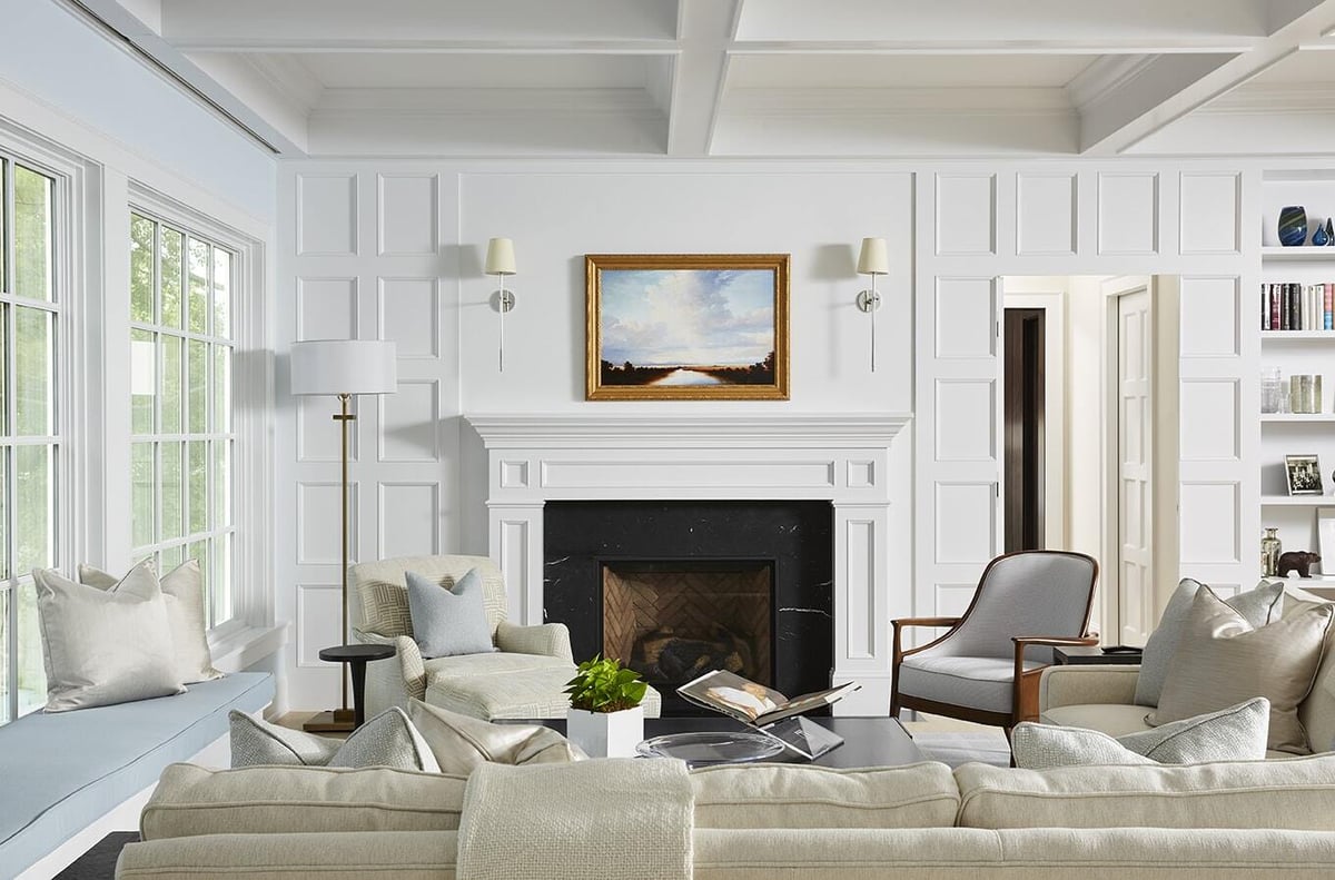 Coastal Chic living room featuring a fireplace and large windows, designed by MA Peterson in the Twin Cities