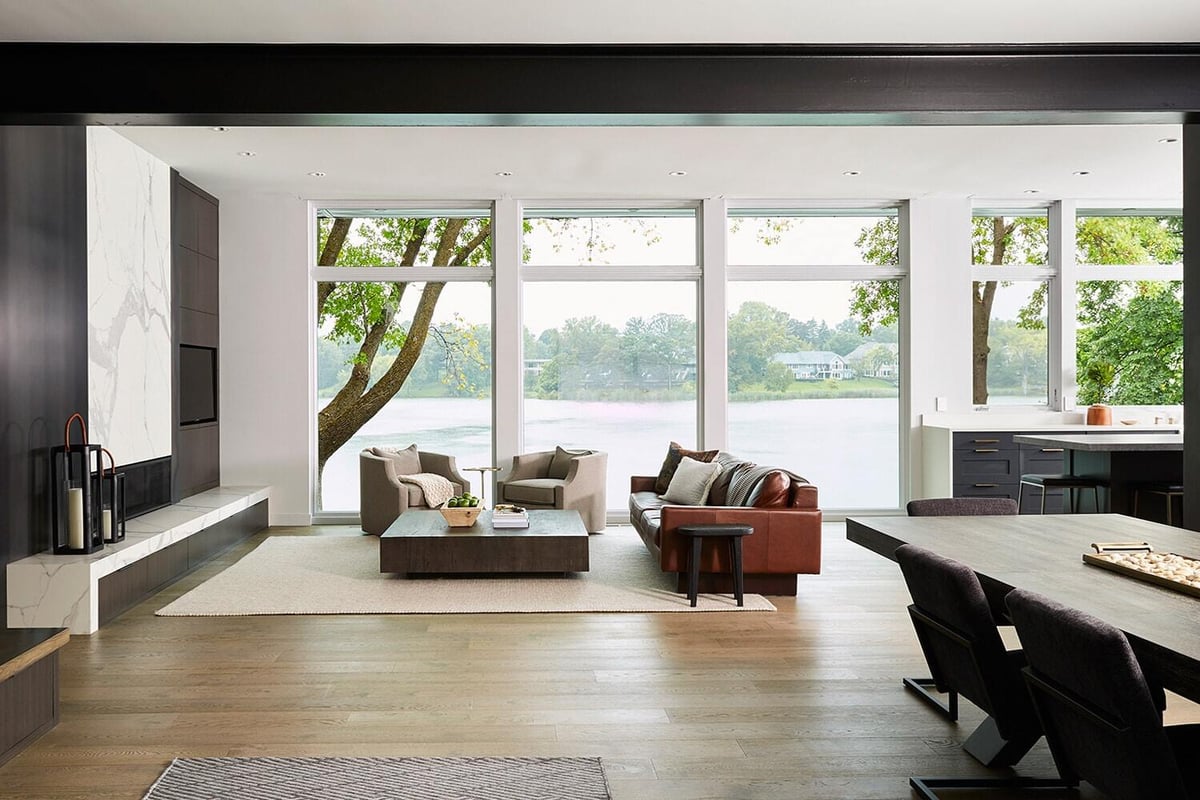 Spacious living room with modern decor overlooking Lake Cornelia, MA Peterson, Twin Cities