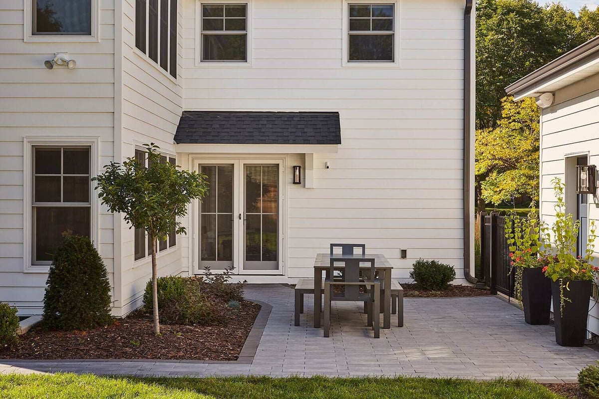 Close-up of patio area in backyard of Twin Cities home remodeled by MA Peterson