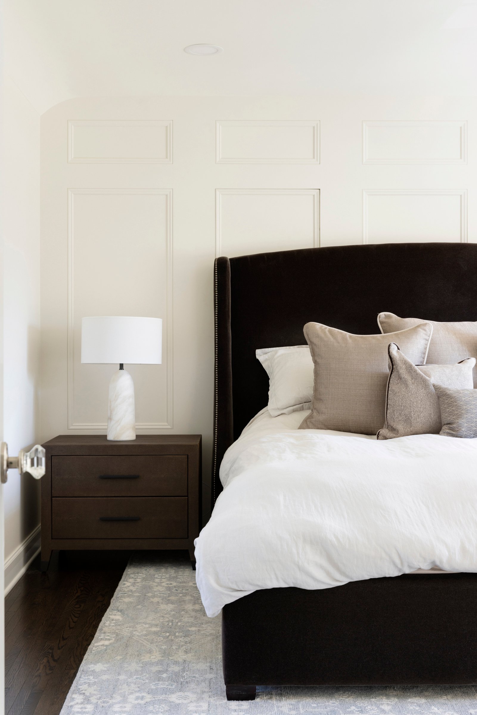 Upper-level primary suite remodel in Edina with custom millwork and serene color palette.