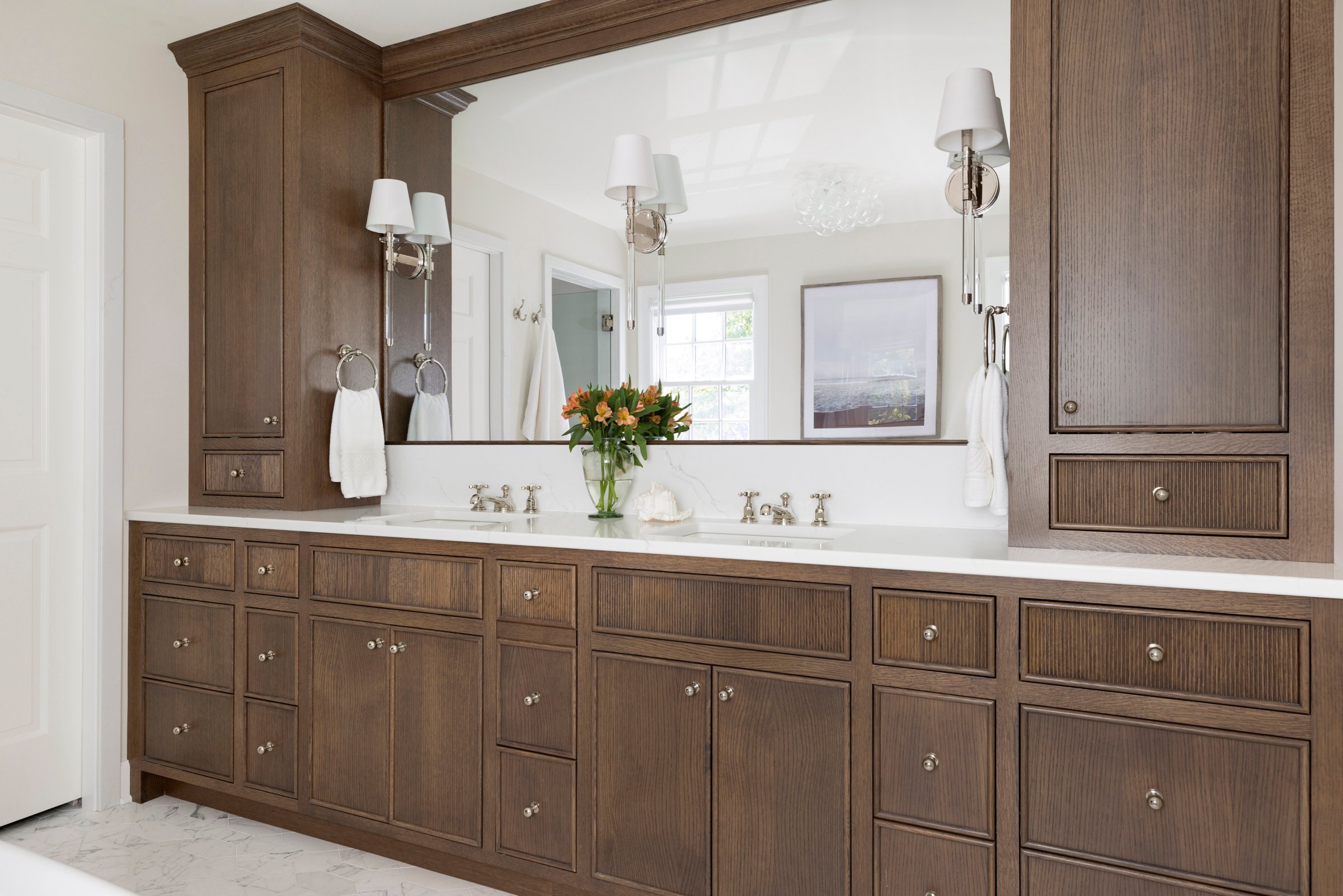Primary bathroom remodel in Edina with freestanding tub, custom vanity, and natural light.