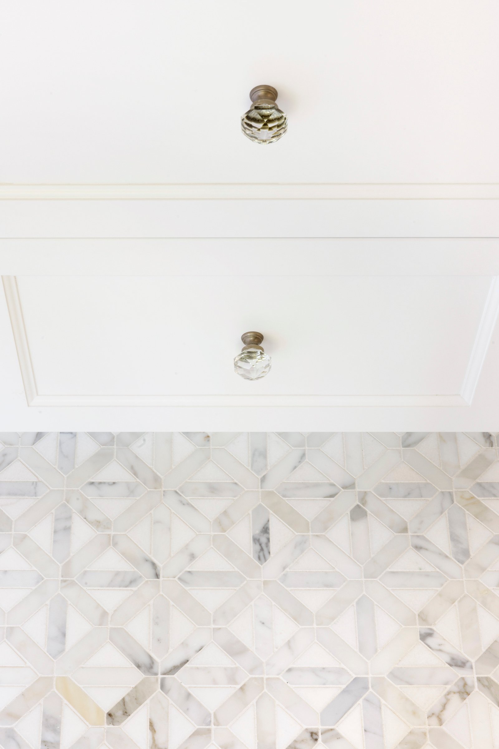 Updated guest bathroom with clean lines, warm finishes, and functional layout.
